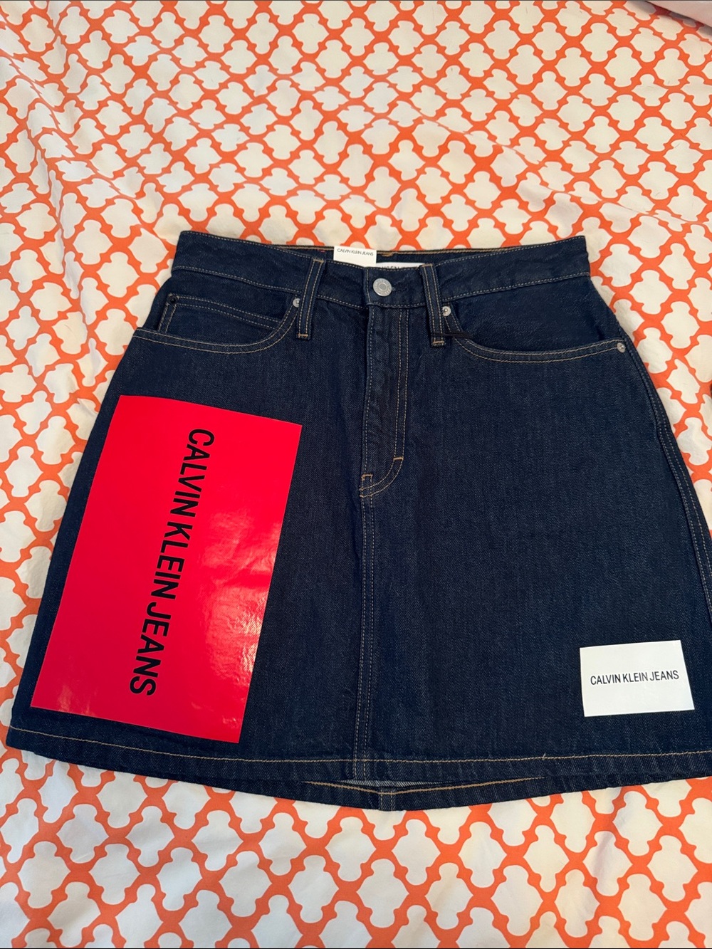 Calvin Klein Dark Indigo A-Line Denim Skirt with Red Logo Patch